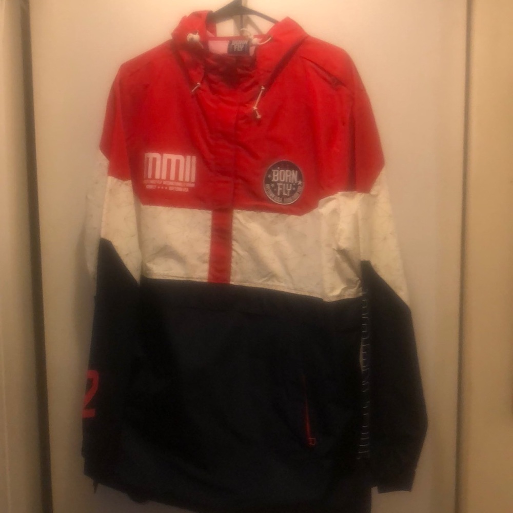 Born fly wind breaker size large worn once three pockets one pouch